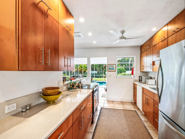 Adorable Two Bedroom Home with Caged Pool & Great Location