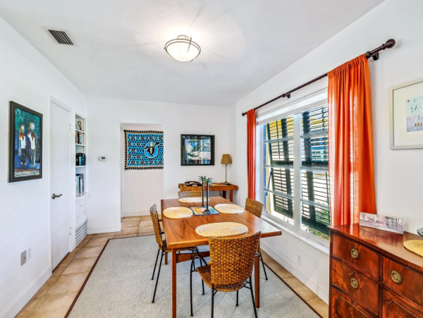 Adorable Two Bedroom Home with Caged Pool & Great Location