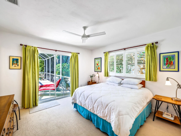 Adorable Two Bedroom Home with Caged Pool & Great Location
