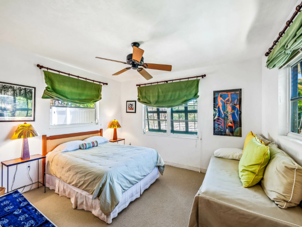 Adorable Two Bedroom Home with Caged Pool & Great Location