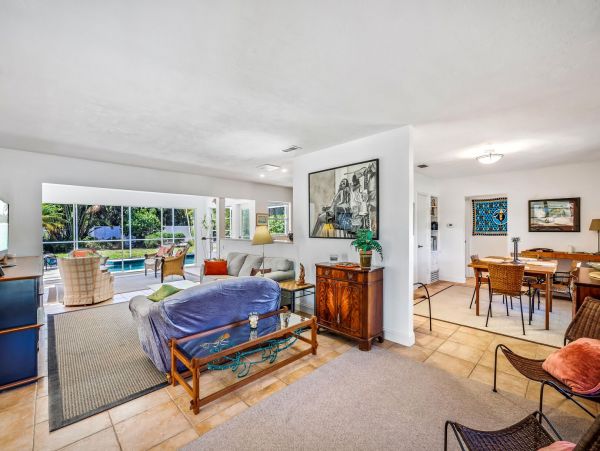 Adorable Two Bedroom Home with Caged Pool & Great Location