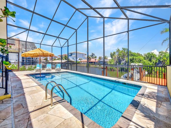Canal-Front 3 Bedroom Vacation Pool Home in Naples