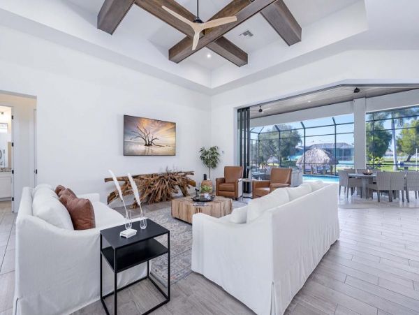 Luxurious Canal-Front Retreat with Caged Pool in Cape Coral