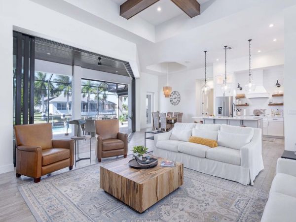 Luxurious Canal-Front Retreat with Caged Pool in Cape Coral