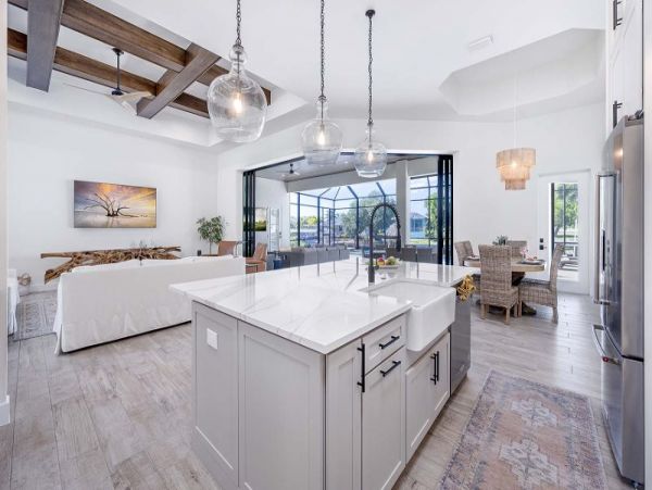 Luxurious Canal-Front Retreat with Caged Pool in Cape Coral