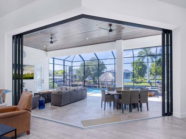 Luxurious Canal-Front Retreat with Caged Pool in Cape Coral
