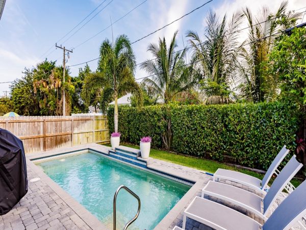 Luxury Three Bedroom Home with Private Heated Pool and Spacious Outdoor Seating Area