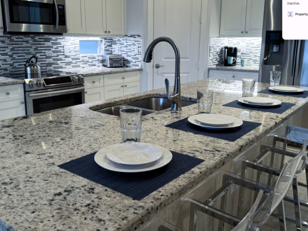 Luxury Three Bedroom Home with Private Heated Pool and Spacious Outdoor Seating Area