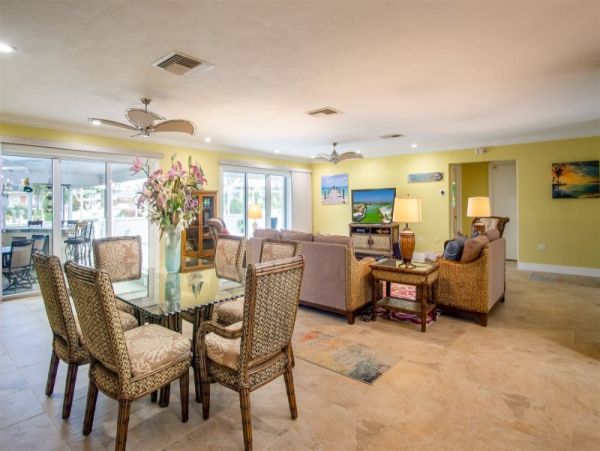 Canal Front Vacation Home with Caged Pool & Boat Dock in Marathon