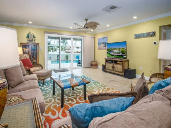 Canal Front Vacation Home with Caged Pool & Boat Dock in Marathon