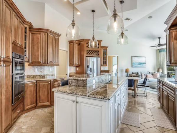 Marco Island Canalfront Four Bedroom Home with Caged Pool