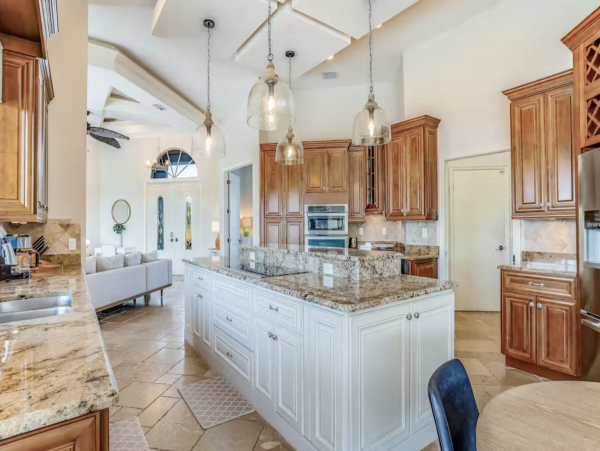 Marco Island Canalfront Four Bedroom Home with Caged Pool