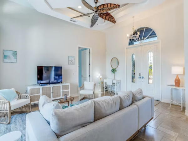 Marco Island Canalfront Four Bedroom Home with Caged Pool
