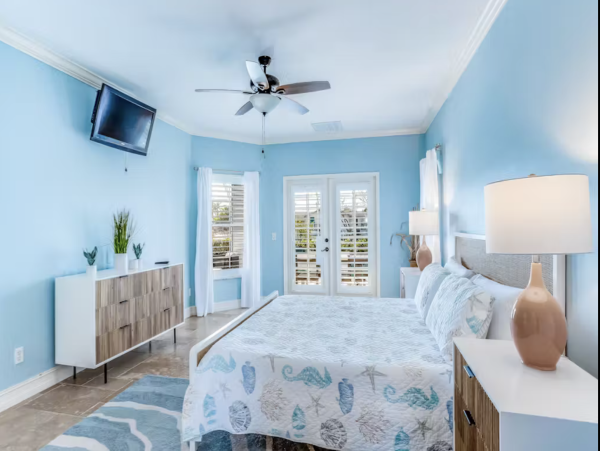 Marco Island Canalfront Four Bedroom Home with Caged Pool