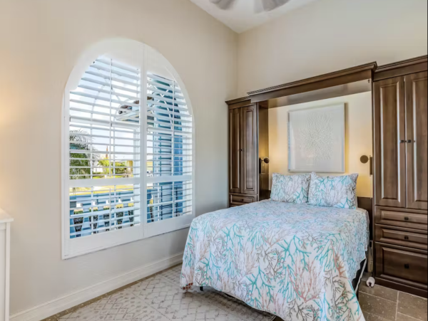 Marco Island Canalfront Four Bedroom Home with Caged Pool