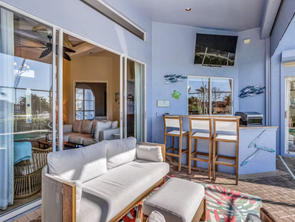 Marco Island Canalfront Four Bedroom Home with Caged Pool