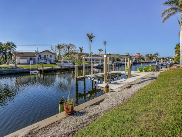 Marco Island Canalfront Four Bedroom Home with Caged Pool