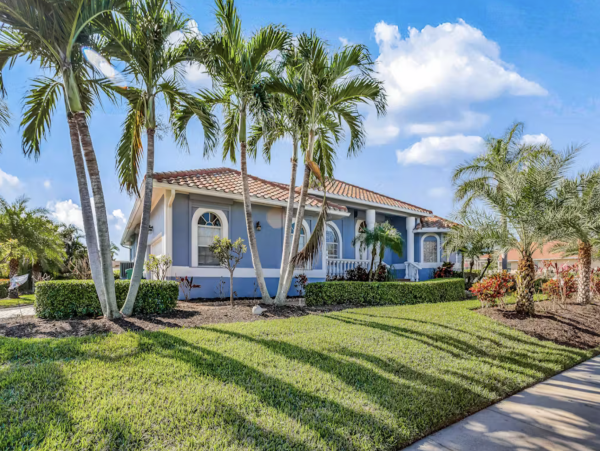 Marco Island Canalfront Four Bedroom Home with Caged Pool