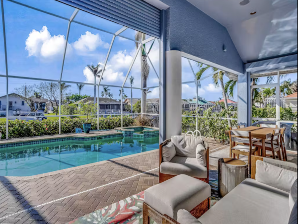 Marco Island Canalfront Four Bedroom Home with Caged Pool