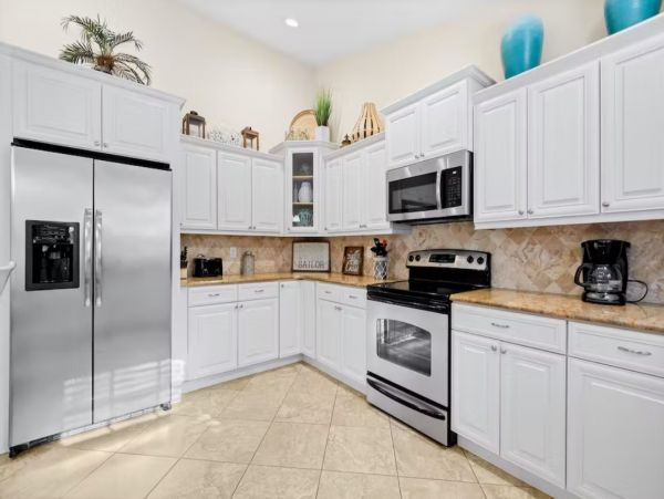 Six Bedroom Duplex with Two Pools in Holmes Beach