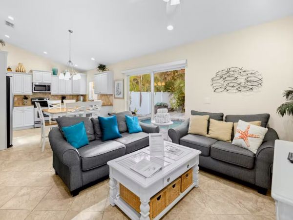 Six Bedroom Duplex with Two Pools in Holmes Beach