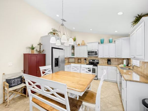 Six Bedroom Duplex with Two Pools in Holmes Beach