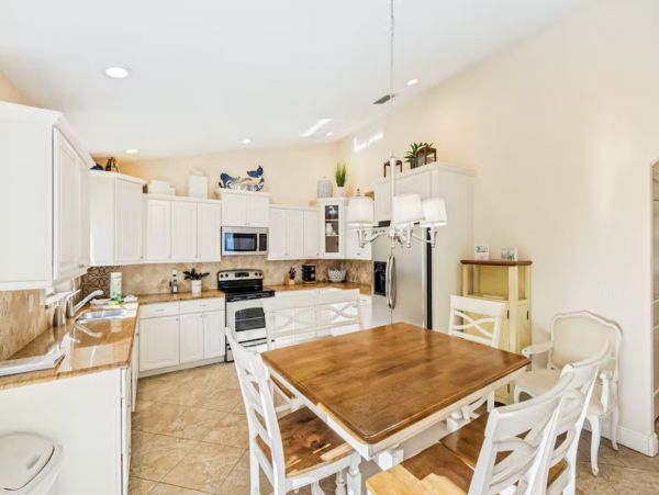 Six Bedroom Duplex with Two Pools in Holmes Beach