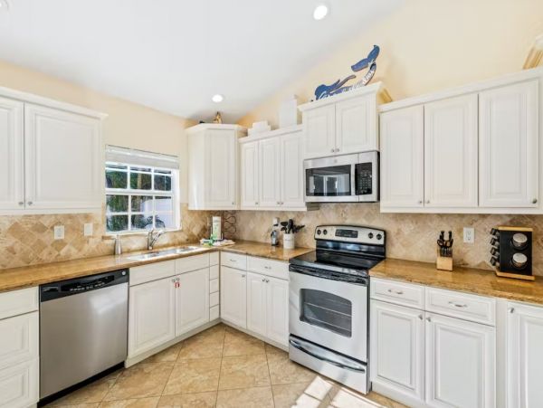 Six Bedroom Duplex with Two Pools in Holmes Beach
