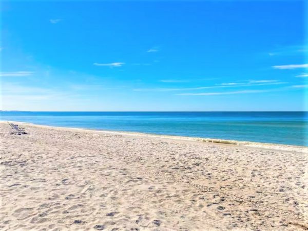 Six Bedroom Duplex with Two Pools in Holmes Beach