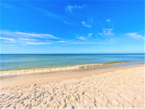 Six Bedroom Duplex with Two Pools in Holmes Beach
