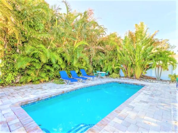 Six Bedroom Duplex with Two Pools in Holmes Beach