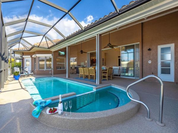 Canalfront Luxury Vacation Home with Pool and Boat Dock