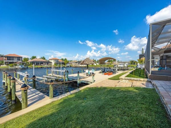 Canalfront Luxury Vacation Home with Pool and Boat Dock