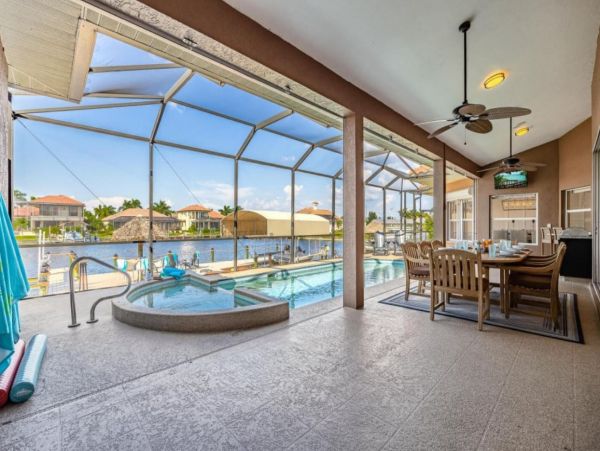 Canalfront Luxury Vacation Home with Pool and Boat Dock
