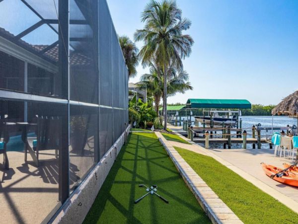 Canalfront Luxury Vacation Home with Pool and Boat Dock