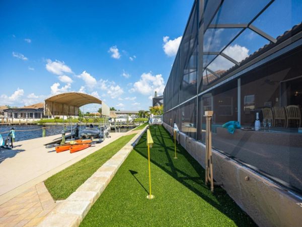 Canalfront Luxury Vacation Home with Pool and Boat Dock
