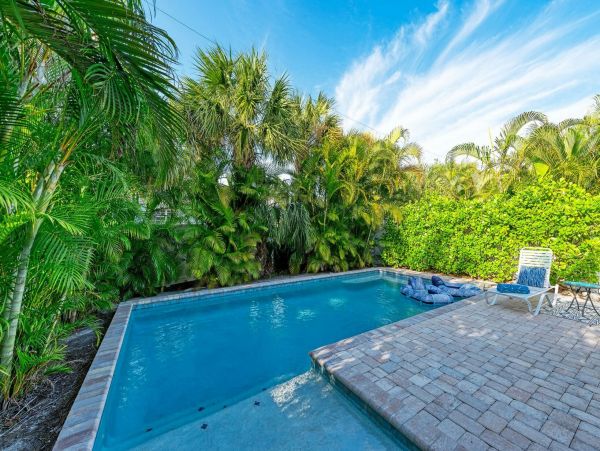 Homes Beach Two Bedroom Vacation Duplex with Private Pool