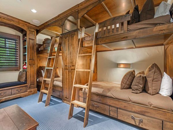 Bedroom 3 boasts gorgeous built in bunk beds with individual lighting, reading nook and mounted TV.