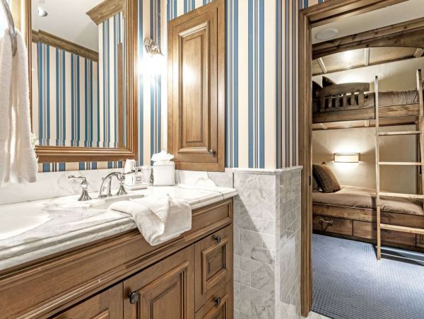 Jack N Jill bathroom with double vanity, shared by bedrooms 2 and 3.