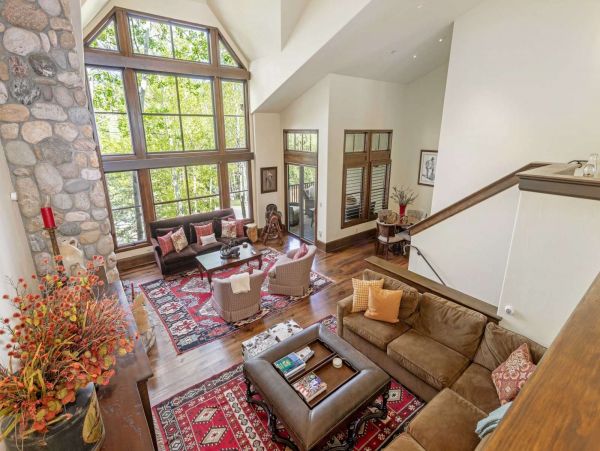 View of the 3 gathering areas on the third level of the home from the kitchen and dining level.