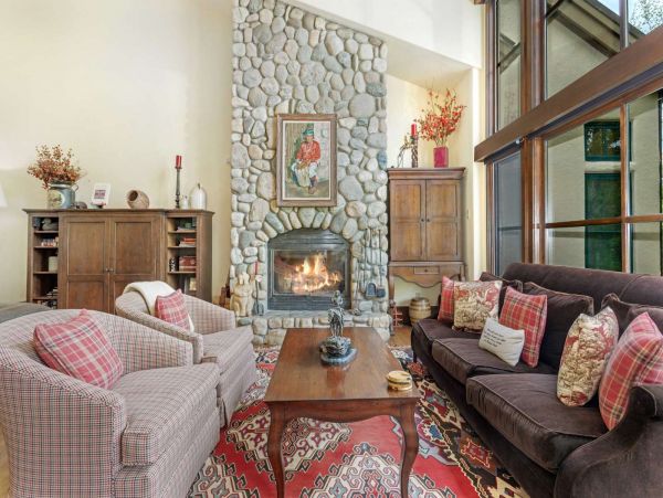 Relax around the wood burning fireplace after your days adventure.