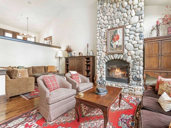 View of family room and upper level kitchen and dining.