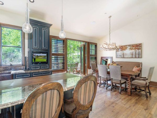 Enjoy watching the morning news while sitting at the breakfast bar with seating for 3 guests.