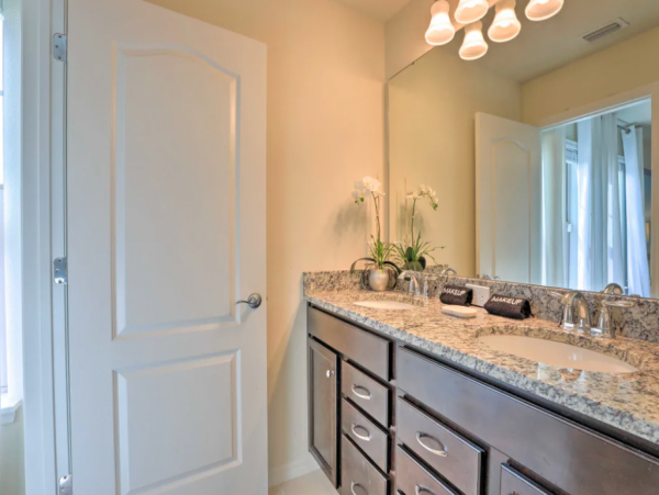 Sleek, Refreshing 8 Bedroom Pool Home with Great Community Amenities