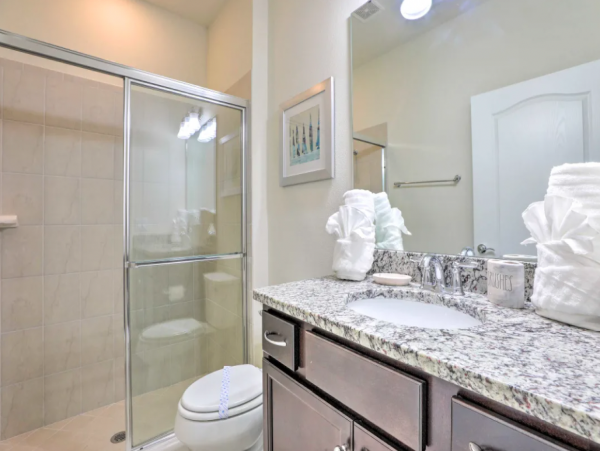 Sleek, Refreshing 8 Bedroom Pool Home with Great Community Amenities