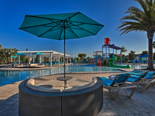 Sleek, Refreshing 8 Bedroom Pool Home with Great Community Amenities