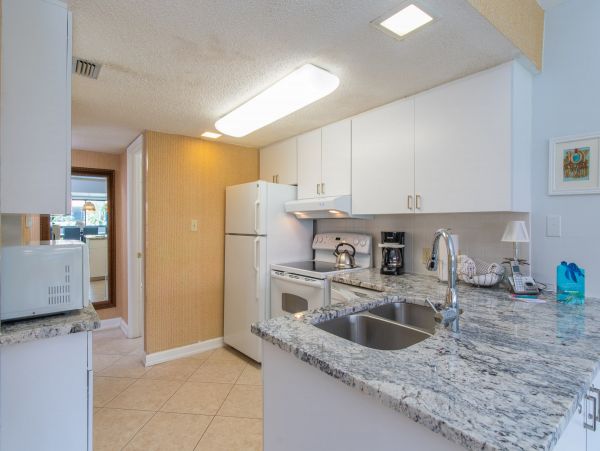 2nd floor Beachside Condo with garden courtyard view