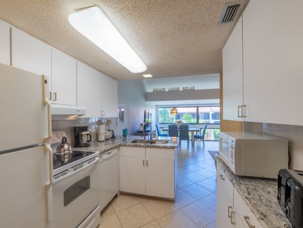 2nd floor Beachside Condo with garden courtyard view