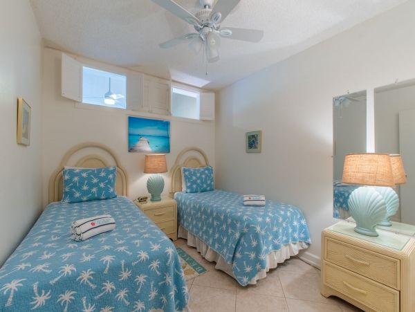 2nd floor Beachside Condo with garden courtyard view