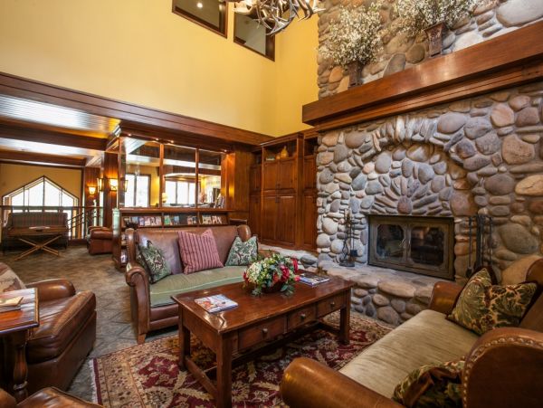 Lovely common great room outside lobby area with cozy fireplace.